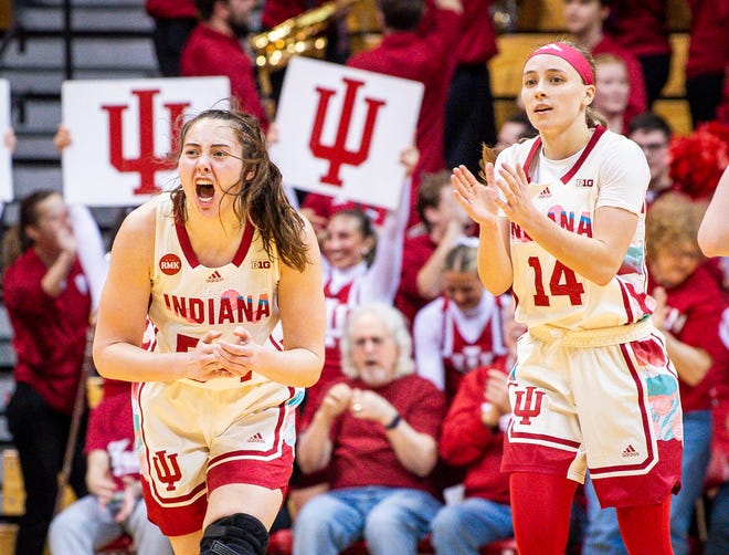 Indiana's Mackenzie Holmes (54) and Sara Scalia (14) celebrate a Hoosier lead during the second half of the Indiana versus Michigan State women's basketball game at Simon Skjodt Assembly Hall on Thursday, Feb. 8, 2024.