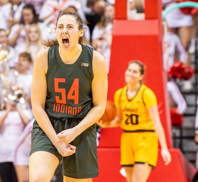 Indiana's Mackenzie Holmes (54) celebrates a big Hoosier lead during the second half of the Indiana versus Iowa women's basketball game at Simon Skjodt Assembly Hall on Thursday, Feb. 22, 2024.