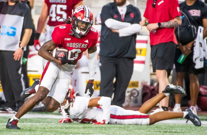 Indiana's Andison Coby (0) runs after the catch during the Indiana football spring game at Memorial Stadaium on Thursday, April 18, 2024.