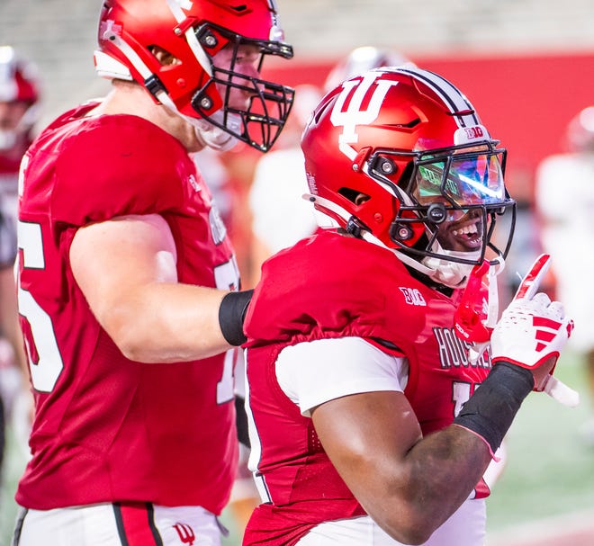 Indiana's Ty Son Lawton (17) celebrates a touchdown during the Indiana football spring game at Memorial Stadaium on Thursday, April 18, 2024.