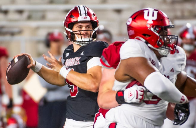 Indiana's Kurtis Rourke (9) prepares to pass during the Indiana football spring game at Memorial Stadaium on Thursday, April 18, 2024.