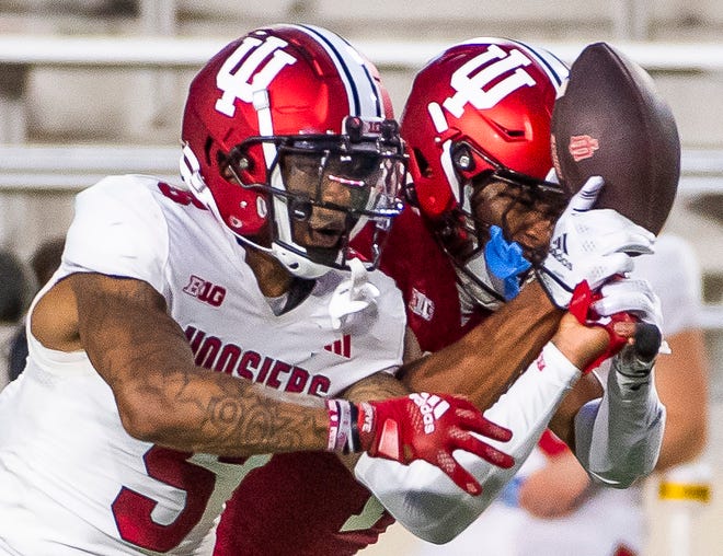 Indiana's Kobee Minor (5) breaks up a pass intended for Donaven McCulley (1) during the Indiana football spring game at Memorial Stadaium on Thursday, April 18, 2024.