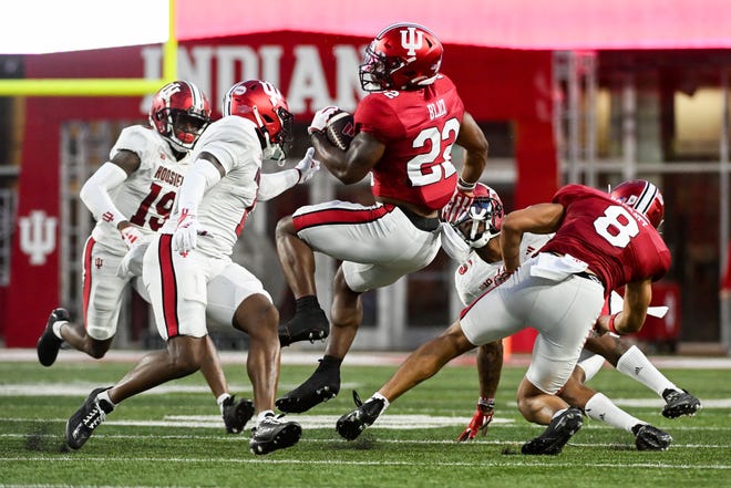 Indiana Hoosiers running back Kaelon Black (22) runs the ball during the Indiana football spring game at Memorial Stadium on Thursday, April 18, 2024.