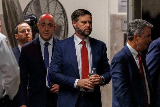 J. D. Vance enters the courtroom for the criminal trial of former President Donald Trump at New York State Supreme Court in New York on May 13, 2024. Trump is facing 34 felony counts of falsifying business records related to payments made to adult film star Stormy Daniels during his 2016 presidential campaign.