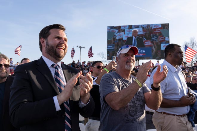 J.D. Vance, a Republican candidate for U.S. Senate in Ohio, applauds as former President Donald Trump speaks during a rally hosted by the former president at the Delaware County Fairgrounds on April 23, 2022 in Delaware, Ohio.