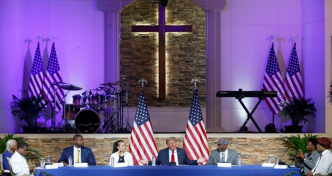 With a table of invited guests offering thoughts and asking questions, former President Donald Trump talked about various issues concerning the African-American community inside the 180 Church in Detroit on Saturday, June 15, 2024.