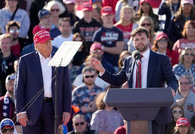 Former President Donald Trump campaigns with Sen. J.D. Vance, R-Ohio, on March 16, 2024, in Dayton.