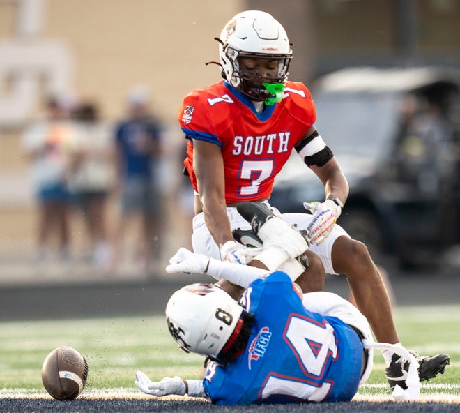 Indiana All-Star South Stephon Opoku (7) blocks Indiana All-Star North Demario Spence (14) from receiving the ball during the Indiana Football Coaches All-Star game, Friday, July 12, 2024, at Decatur Central High School in Indianapolis.