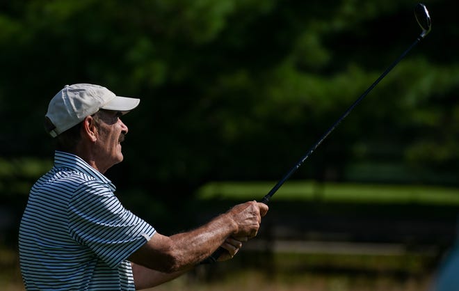 Rory Brown watches his tee shot during the semi-finals in the Super Senior Championship division in the City Golf Tournament at Cascades Golf Course on Saturday, July 13, 2024.