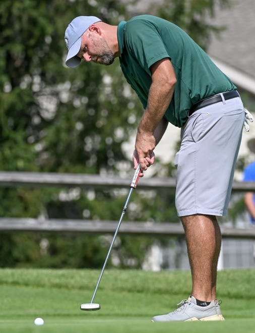 Chris Williams hits a putt during the semi-finals in the Men's Championship division in the City Golf Tournament at Cascades Golf Course on Saturday, July 13, 2024.