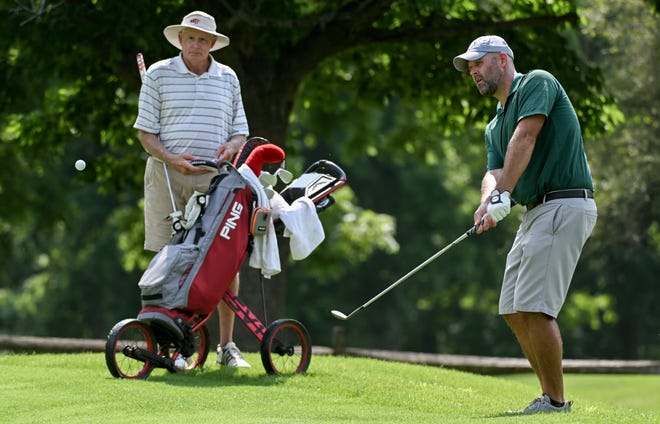 Chris Williams chips onto the green during the semi-finals in the Men's Championship division in the City Golf Tournament at Cascades Golf Course on Saturday, July 13, 2024.