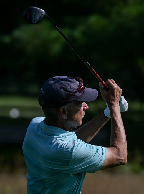 Dan Neubecker watches a tee shot during the semi-finals in the Super Senior Championship division in the City Golf Tournament at Cascades Golf Course on Saturday, July 13, 2024.