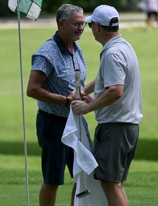 Charles Combs and Jim Alexander congratulate each other after their semi-final match in the Senior Championship division in the City Golf Tournament at Cascades Golf Course on Saturday, July 13, 2024.