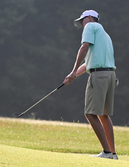 Brad McLaughlin chips onto the green during the semi-finals in the Men's Championship division in the City Golf Tournament at Cascades Golf Course on Saturday, July 13, 2024.