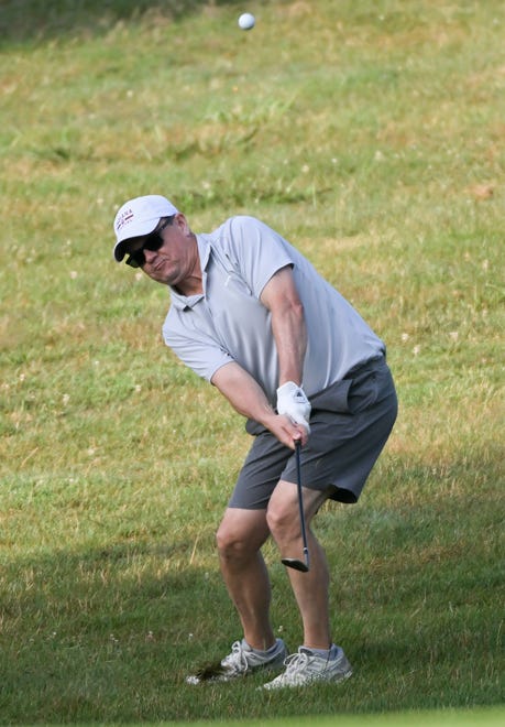 Jim Alexander chips onto the green during the semi-finals in the Senior Championship division in the City Golf Tournament at Cascades Golf Course on Saturday, July 13, 2024.