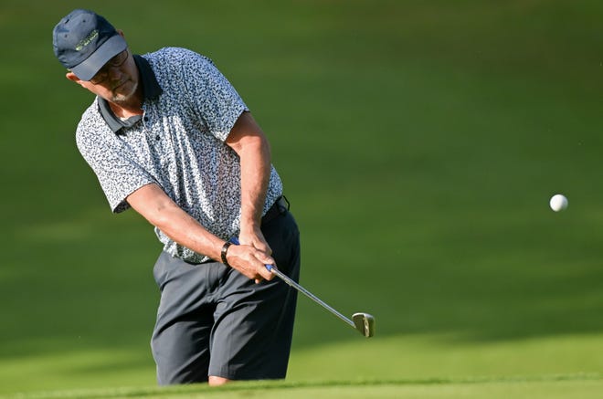 Charles Combs chips onto the green during the semi-finals in the Senior Championship division in the City Golf Tournament at Cascades Golf Course on Saturday, July 13, 2024.