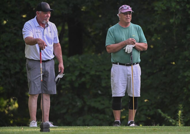 Troy Gillespie (left) and Tim Gillespie wait to tee off during the semi-finals in the Senior Championship division of the City Golf Tournament at Cascades Golf Course on Saturday, July 13, 2024.