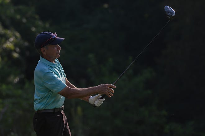 Dan Neubecker hits a shot during the semi-finals in the Super Senior Championship division in the City Golf Tournament at Cascades Golf Course on Saturday, July 13, 2024.