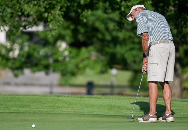 Rory Brown hits a putt during the semi-finals in the Super Senior Championship division in the City Golf Tournament at Cascades Golf Course on Saturday, July 13, 2024.