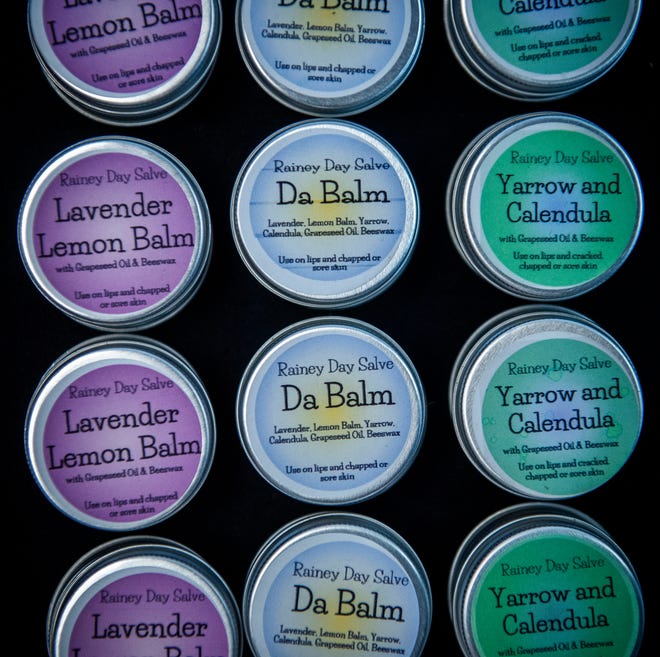 Balms for sale at the Rainey Day Adventures booth during the Midsommar Market at the Monroe County Convention Center on Saturday, July 13, 2024. The event was put on by The Burnished Raven.