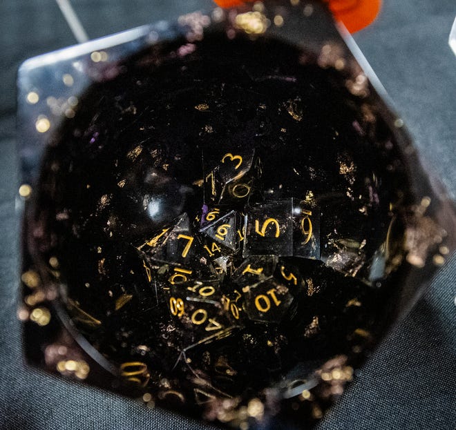 A custom made dice holder at the Puking Badger booth during the Midsommar Market at the Monroe County Convention Center on Saturday, July 13, 2024. The event was put on by The Burnished Raven.