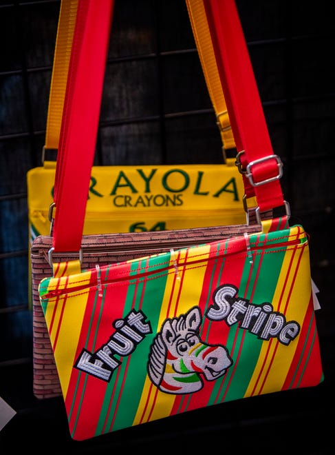 A Fruit Stripe themed purse at the Enchanted Playground booth during the Midsommar Market at the Monroe County Convention Center on Saturday, July 13, 2024. The event was put on by The Burnished Raven.