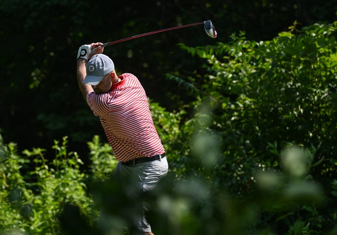 Chris Williams lines up a tee shot during the finals in the Men’s Championship division of the City Golf Tournament at Cascades Golf Course on Sunday, July 14, 2024.