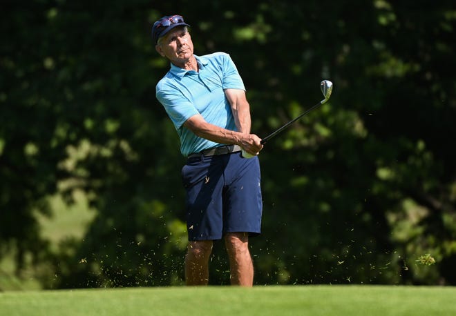 Dan Neubecker hits a shot during the finals in the Super Senior Championship division of the City Golf Tournament at Cascades Golf Course on Sunday, July 14, 2024.