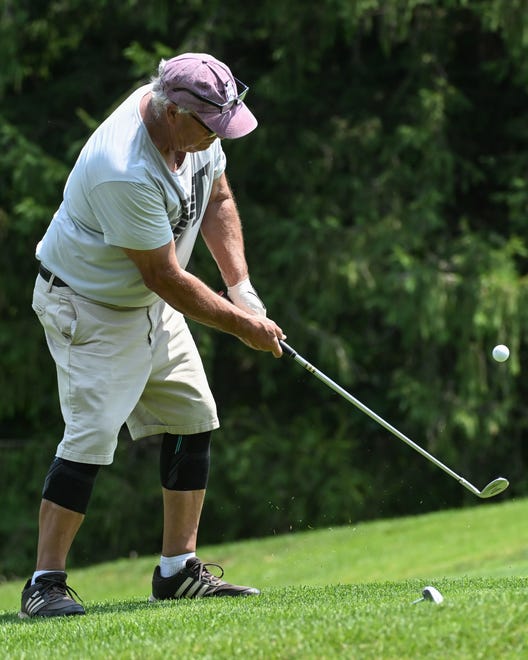 Tim Gillespie chips onto the green during the finals in the Senior Championship division of the City Golf Tournament at Cascades Golf Course on Sunday, July 14, 2024.