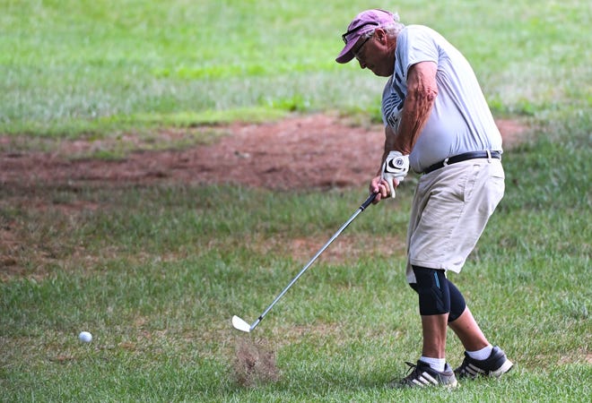 Tim Gillespie hits a shot during the finals in the Senior Championship division of the City Golf Tournament at Cascades Golf Course on Sunday, July 14, 2024.