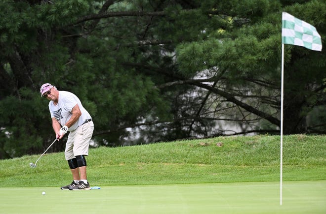 Tim Gillespie hits a putt during the finals in the Senior Championship division of the City Golf Tournament at Cascades Golf Course on Sunday, July 14, 2024.