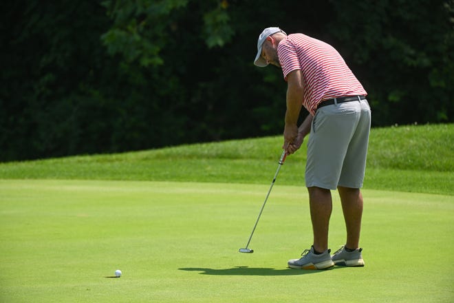 Chris Williams hits a putt during the finals in the Men’s Championship division of the City Golf Tournament at Cascades Golf Course on Sunday, July 14, 2024.