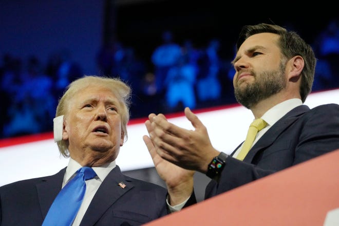 Former President Donald Trump with vice presidential nominee JD Vance during the second day of the Republican National Convention at the Fiserv Forum. The second day of the RNC focused on crime and border policies.