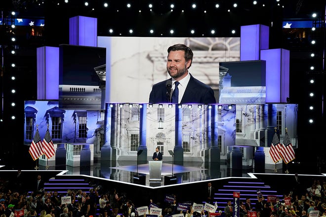 Republican vice presidential nominee Sen. J.D. Vance, R-Ohio, speaks during the third day of the Republican National Convention at Fiserv Forum. The third day of the RNC focused on foreign policy and threats.