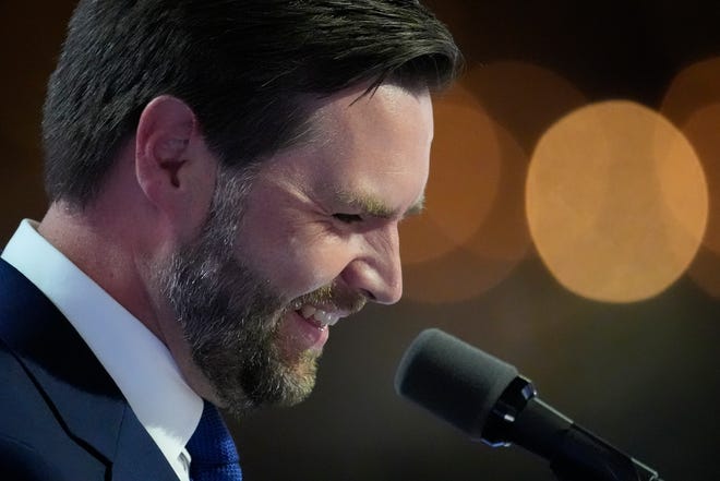 Republican vice presidential nominee Sen. J.D. Vance, R-Ohio, speaks during the third day of the Republican National Convention at Fiserv Forum. The third day of the RNC focused on foreign policy and threats.