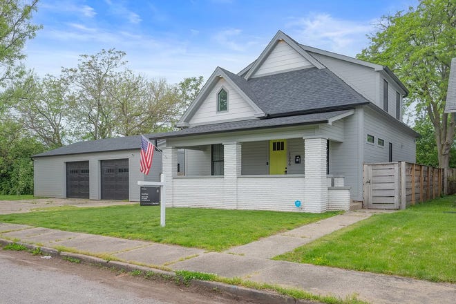 This Indianapolis home for sale has it's own hidden speakeasy, 3 bedrooms, 3 bathrooms and a 4-car garage.