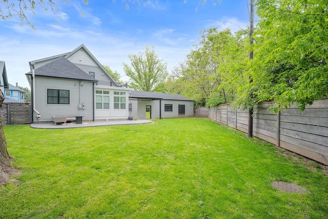 This Indianapolis home for sale has it's own hidden speakeasy, 3 bedrooms, 3 bathrooms and a 4-car garage.