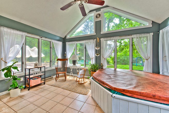 This Eagle Creek home has more than 4,00 sq ft of space and a park-like backyard overlooking a serene pond.