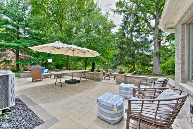 This Eagle Creek home has more than 4,00 sq ft of space and a park-like backyard overlooking a serene pond.