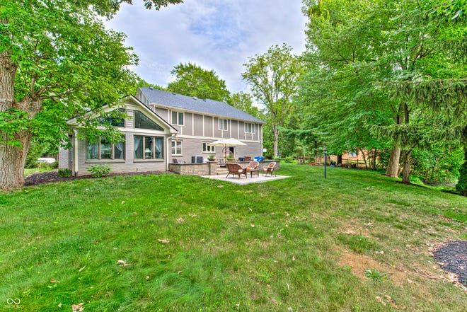 This Eagle Creek home has more than 4,00 sq ft of space and a park-like backyard overlooking a serene pond.